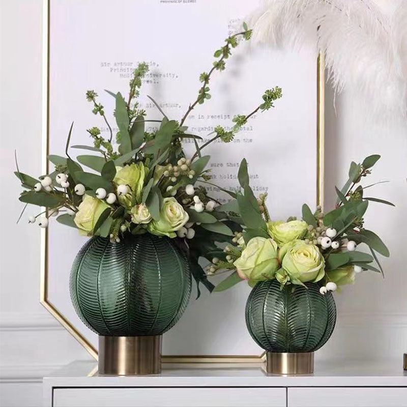 Pair of Green Palm Vases filled with flowers